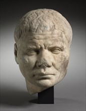 Portrait of a Man, c. 100. Italy, Roman, early 2nd Century. Marble; overall: 26.3 cm (10 3/8 in.).