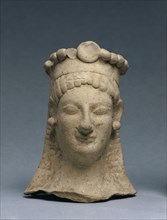 Woman's Head with Crown and Earrings, 600-475 BC. Greece, Sicily (?), 6th Century BC, or early 5th