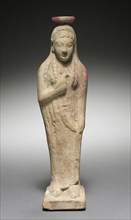 Kore Holding a Dove, 525-500 BC. Greece, Rhodes, late 6th Century BC. Terracotta; overall: 23 cm (9