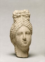 Woman's Head, 300s BC. Greece, Sicily (?), 4th Century BC. Terracotta; overall: 14.5 cm (5 11/16 in