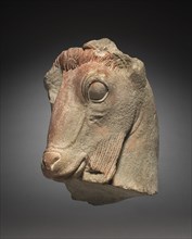 Fragment of a Goat's Head, c. 500 BC. Greece, Attic, late 6th Century BC. Limestone; overall: 35 cm