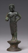 Statuette of a Youth, c. 520-500 BC. Italy, Etruscan, Archaic Period. Bronze; overall: 10.5 cm (4