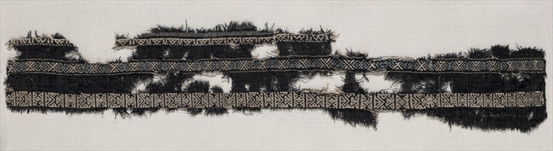 Fragment of Border, 800s. Egypt, 9th century. Wool: plain weave wtih supplementary weft; overall: 9
