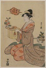 Woman Holding a Wooden Cup Stand Decorated with Chrysanthemums (from the series Elegant Pictures of