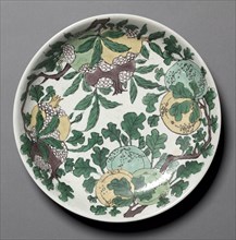 Dish with Dragons, Pomegranates, and Peaches, 1662-1722. China, Jiangxi province, Jingdezhen, Qing