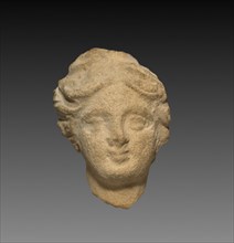 Head of a Girl, 1-200. Parthian, 1st-2nd Century. Terracotta; overall: 3.1 cm (1 1/4 in.).
