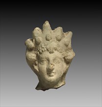 Head of a Goddess, 1-200. Parthian, 1st-2nd Century. Terracotta; overall: 5.8 cm (2 5/16 in.).