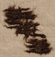 Fragment of Tabby Cloth, 3rd century. Syria, 3rd century. Tabby weave: goat's hair; average: 7 x 4