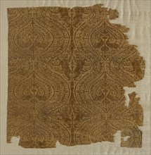Fragment with peacocks in ogival pattern, 1175-1225. Iran or Iraq. Plain weave with supplementary