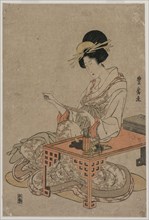 Courtesan Seated at a Writing Table, c. late 1790s. Utagawa Toyohiro (Japanese, 1733-1828). Color