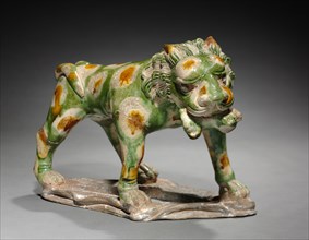 Lion with Cub in Mouth, 618-907. China, Tang dynasty (618-907). Earthenware with polychrome glaze;