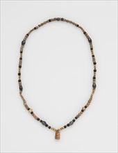 Necklace, before 1532. Peru. Gold with gray and black polished stone beads; overall: 69.8 cm (27