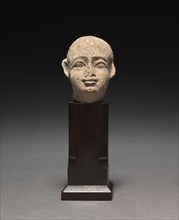 Small Head of a Man, 305-30 BC. Egypt, Ptolemaic Dynasty. Limestone; overall: 4.2 x 3.3 x 4.4 cm (1