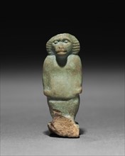 Baboon-Falcon Hybrid Amulet, 715-332 BC. Egypt, Late Period. Pale robin's egg blue faience;