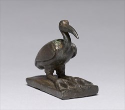 Ibis, 664-30 BC. Egypt, Late Period, Dynasty 26 or later. Bronze, solid cast, with gold-rich