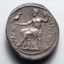 Tetradrachm:  Zeus Aetophoros Enthroned,  Holding Staff (reverse), 336-323 BC. Greece, Alexander