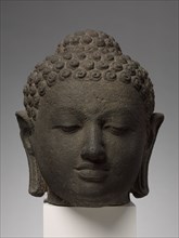 Head of Buddha, early 800s. Indonesia, Java, Borobudur, Sailendra Period, 9th Century. Volcanic