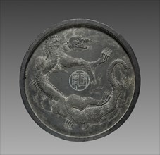Ink Cake with Dragon in Relief, 1621. China, Ming dynasty (1368-1644). Ink cake; diameter: 15 cm (5