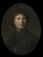 A Young Man with a Chain, c. 1629 or 1632. Rembrandt van Rijn (Dutch, 1606-1669), and Studio. Oil