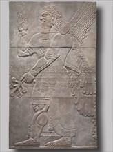 Saluting Protective Spirit, 883-859 BC. Neo-Assyrian, Iraq, Nimrud, Northwest Palace, reign of
