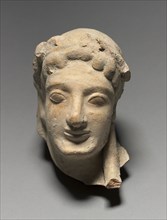 Head, 525 BC. Greece, Sicily, Selinus, 6th Century BC. Terracotta; overall: 12.2 x 9 x 11.8 cm (4
