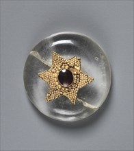 Button, 500s. Byzantium, early Byzantine period, 6th century. Rock crystal with a garnet mounted in