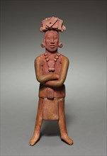 Figure, 317-987. Mexico, Jaina, Campeche, Maya, 4th-10th Century. Terracotta; overall: 23.5 x 10.5