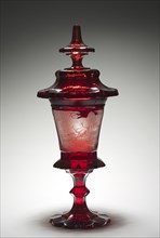 Covered Cup, mid-1800s. Bohemia, 19th century. Ruby glass with engraved decoration; diameter: 36.5