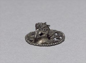 Eagle Ornament, c. 1200-1519. Mexican, Oaxaca, Mixtec style. Silver; diameter: 2.2 cm (7/8 in.);