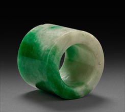Thumb Ring, 1800s-1900s. China, 19th-20th century. Green and white jade; diameter: 3.1 cm (1 1/4 in