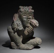 Seated Male Carrying Maize, 1325-1521. Central Mexico, Aztec style, 13th-16th century. Stone,