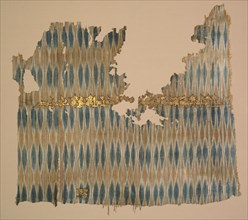Ikat tiraz, 960-980. Yemen, San'a', Zaydi Imam period. Resist-dyed warp (ikat); plain weave with