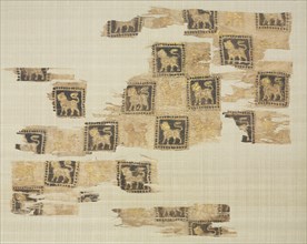 Fragment with gold leaf lions, 1000s - 1100s. Iran or Iraq, Seljuk period. Plain weave: silk warp