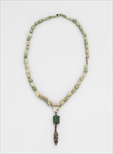 Necklace, before 1532. Peru. Turquoise and stone; overall: 66 cm (26 in.); pendant: 7.6 cm (3 in.).