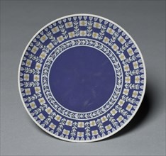 Saucer, c. 1784. Wedgwood Factory (British). Jasper ware with relief decoration; diameter: 13.2 cm