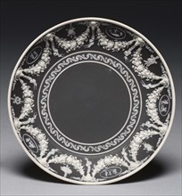 Saucer, c. 1790. Wedgwood Factory (British). Jasper ware with relief decoration; diameter: 6.7 x 6