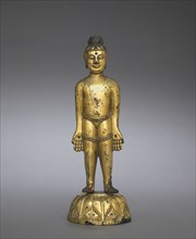The New-born Buddha, 400s. China, Northern Wei dynasty (386-534). Gilt bronze with inlays of blue