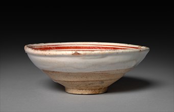 Cup: Cizhou ware, 1100s-1200s. China, Jin dynasty (1115-1234). Buff stoneware with underglaze slip