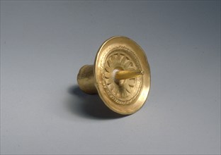 Ear Spool, c. 400-900. Panama, Conte style, 5th - 10th century. Hammered gold; diameter: 3 cm (1