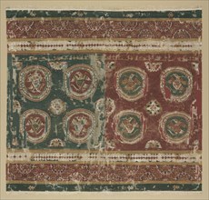 Pillow cover with Arabic inscription, 800s. Egypt, al-Bahnasa. Tapestry weave: wool and linen;