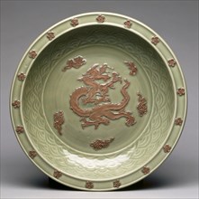 Plate with Relief Dragon among Clouds, 1300s. China, Zhejiang province, Longquan region, Yuan