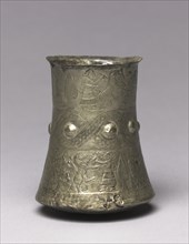 Hero and Animal Combat Beaker, 900-700 BC. Iran, Luristan, 9th-7th Century BC. Silver, repoussé,