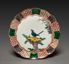 One of a Pair of Dishes with Singing Bird on a Rock: In Ko Kutani Style, 18th century. Japan, Edo