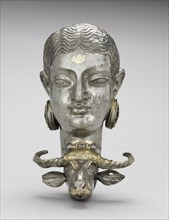 Rhyton:  The Buffalo-Slayer Goddess, c. 600-700. Iran, Sasanian, 7th-8th Century. Silver; overall: