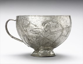 Lion Hunting Cup , 1100-1000 BC. Northwestern Iran, Amlash, 12th-11th century BC. Silver, raised,