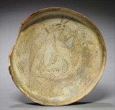 Deep Plate with Hawk, Rabbit, and Foliage, 1100s. Byzantium, 12th century. Sgraffito earthenware;