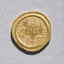 Solidus of Justinian I , c. 545-565. Byzantium, Constantinople, Byzantine period, 6th century.