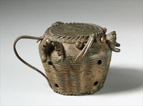 Gold Weight: Drum with Jaws of Defeated Enemies, 1800s. Guinea Coast, Ghana, Asante, 19th century.