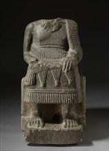 Seated Ruler, 2000-1700 BC. North Syria, possibly the area of Ebla, 2000-1700 BC. Limestone with