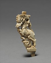 Carved Bracket, 1600s. South India, probably Madura area, 17th century. Ivory; overall: 10.2 cm (4